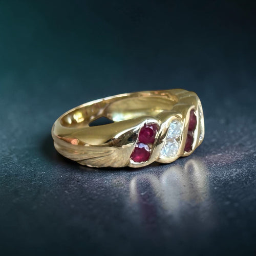 Bague 55 Bague jonc torsadée rubis et diamants en or jaune 18 carats 58 Facettes 97