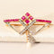 Montre Brosche antique en or jaune 750 avec rubis, diamants et perle 58 Facettes