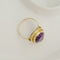 Bague 67 Bague vintage en or jaune 14K avec améthyste ovale 58 Facettes 3135