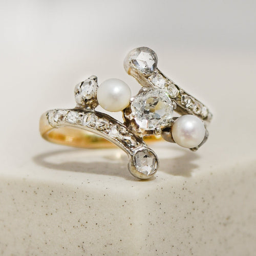 Bague 50 Bague Art nouveau en or jaune et blanc 18 carats avec perles et diamants 58 Facettes 2922