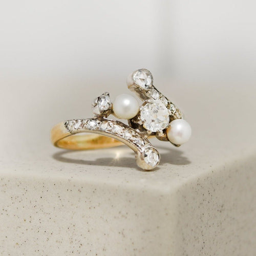 Bague 50 Bague Art nouveau en or jaune et blanc 18 carats avec perles et diamants 58 Facettes 2922