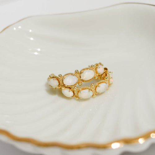 Boucles d'oreilles Boucles d’oreilles vintage en or jaune 14 carats aux opales 58 Facettes 2870