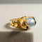 Bague 60 Lapponia - Bague en or jaune 14 carats avec perle grise 58 Facettes 2896