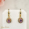 Boucles d'oreilles Boucles d’oreilles vintage en or jaune 14 carats et améthystes 58 Facettes 2788