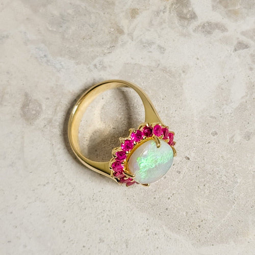 Bague 55.5 Bague solitaire en or 18 carats avec opale et rubis 58 Facettes 2705
