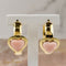 Boucles d'oreilles Créoles en or jaune 18 carats avec insert en corail 58 Facettes 2515