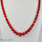 Collier Collier en corail avec fermoir en or jaune 18 carats 58 Facettes 2523