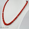 Collier Collier en corail avec fermoir en or jaune 18 carats 58 Facettes 2523