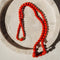 Collier Collier en corail avec fermoir en or jaune 18 carats 58 Facettes 2523