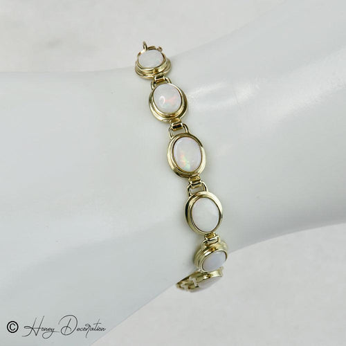 Bracelet Bracelet vintage en or jaune 14 carats et opales 58 Facettes 2556