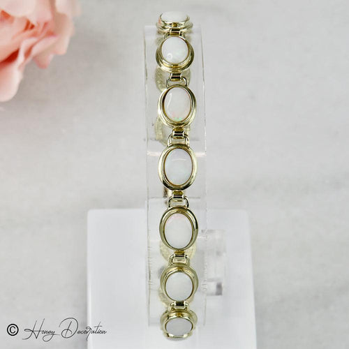 Bracelet Bracelet vintage en or jaune 14 carats et opales 58 Facettes 2556