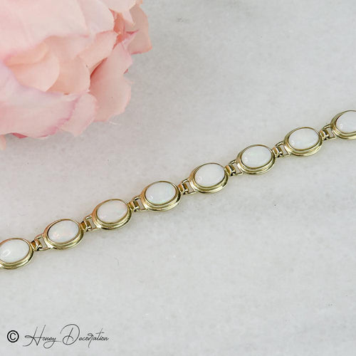 Bracelet Bracelet vintage en or jaune 14 carats et opales 58 Facettes 2556