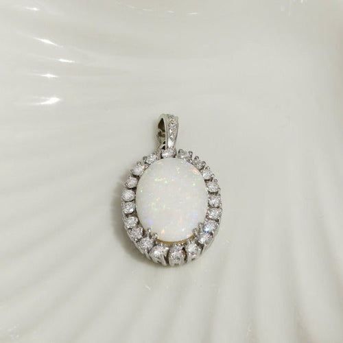 Pendentif Pendentif en platine avec boulder opale et diamants 58 Facettes 2842