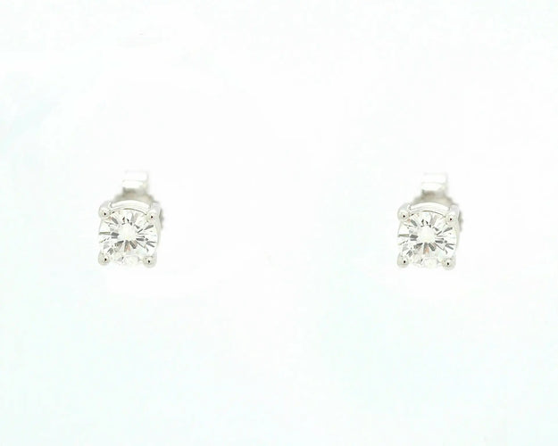 Boucles d'oreilles Boucles d’oreilles puces point de lumière en or blanc 18 ct et diamants 0,56 ct 58 Facettes 10669
