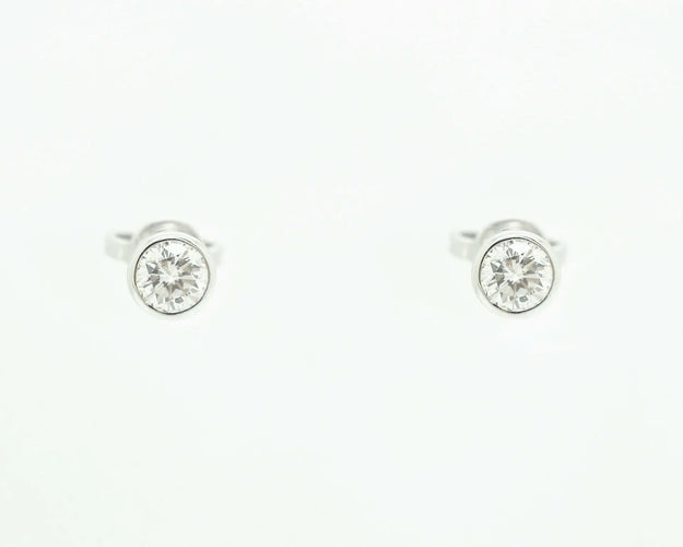 Boucles d'oreilles Boucles d’oreilles point de lumière en or blanc 18 ct et diamants 0,60 ct 58 Facettes 10501