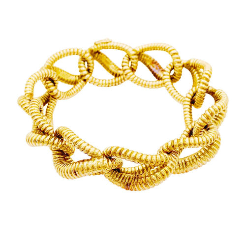 Bracelet Mellerio - Bracelet vintage à maillons torsadés en or jaune 18 carats 58 Facettes 35262