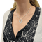 Collier Poiray Cœur Secret - Collier en or blanc et diamants 58 Facettes 34278