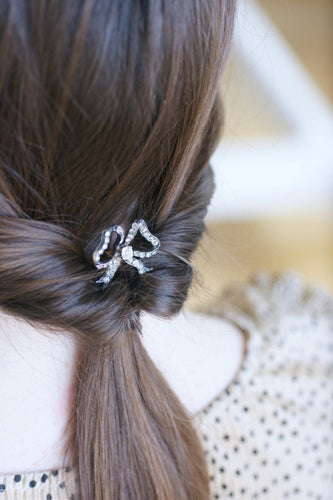 Peigne à cheveux nœud en corne, métal argenté et pierres du Rhin 58 Facettes