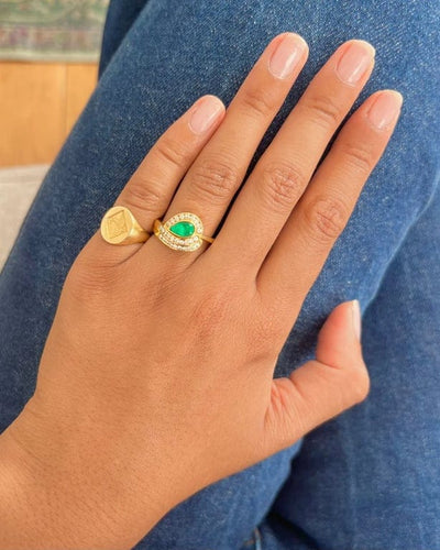 Bague 54 Bague Tourbillon or jaune, émeraude et diamants 58 Facettes