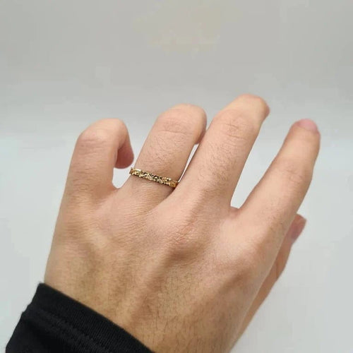 Bague 52.5 Alliance or jaune 18 carats avec des motifs 58 Facettes