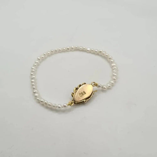 Bracelet Bracelet or jaune 14 carats serti de perles et pierre verte 58 Facettes
