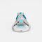 Bague 52 Bague taille poire en or gris 18k, topaze bleue et diamants 58 Facettes LJ12