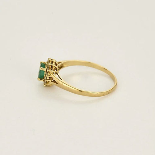 Bague 64 Bague marguerite en or jaune, émeraude et diamants 58 Facettes AUX1288X2
