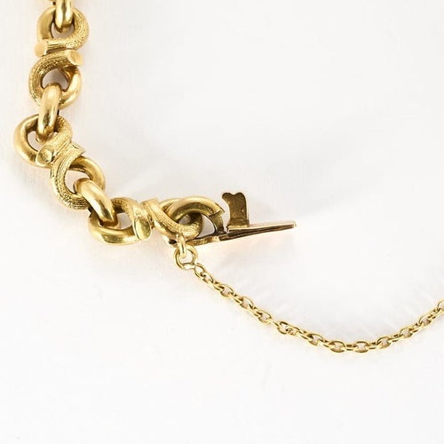Bracelet Bracelet charm's en or jaune . Napoléon III. 58 Facettes HOU5773