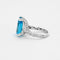 Bague 52 Bague taille poire en or gris 18k, topaze bleue et diamants 58 Facettes LJ12