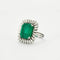 Bague 53 Bague marguerite en or blanc 18k et émeraude 13ct 58 Facettes 1972