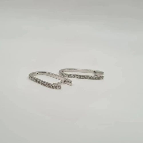 Boucles d'oreilles Créoles or blanc 18 carats serties diamants naturels 58 Facettes