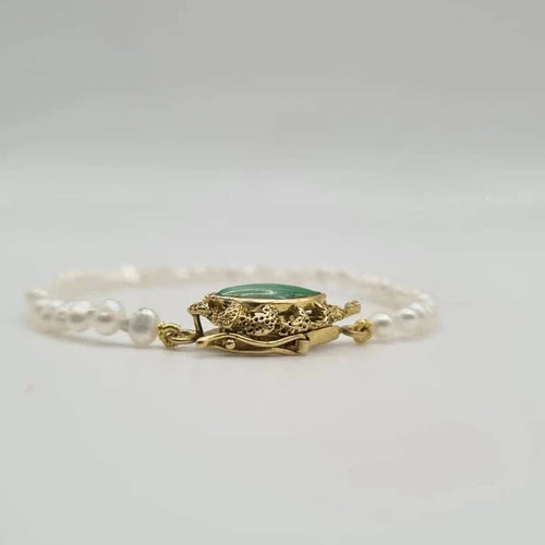 Bracelet Bracelet or jaune 14 carats serti de perles et pierre verte 58 Facettes