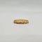 Bague 52.5 Alliance or jaune 18 carats avec des motifs 58 Facettes