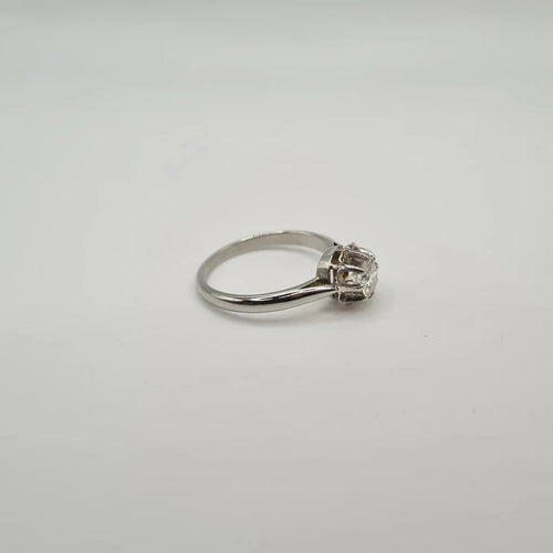 Bague 58 Bague or blanc sertie d'un diamant 58 Facettes