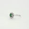 Bague 57 Bague marguerite en or gris, émeraude et diamants 58 Facettes GU88