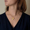 Pendentif Pendentif médaille du zodiaque, or jaune et or gris et diamants 58 Facettes BOU0484