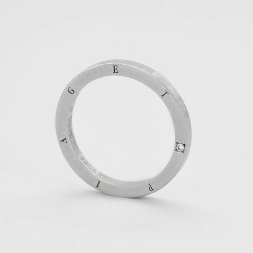Bague 62 Piaget - Alliance en platine et petit diamant 58 Facettes B1