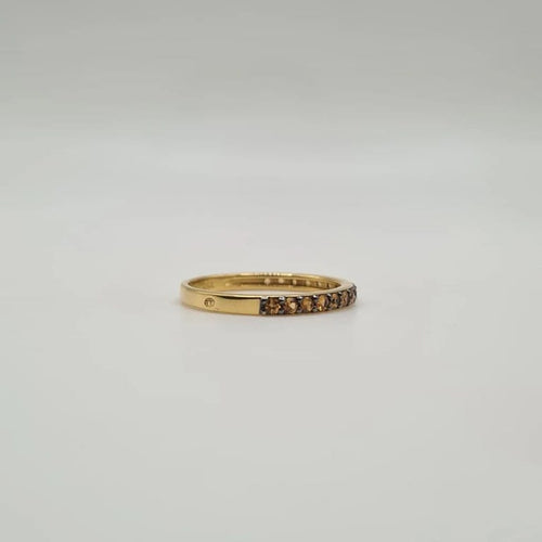 Bague 54 Demi-alliance or jaune 18 carats sertie de saphirs oranges 58 Facettes