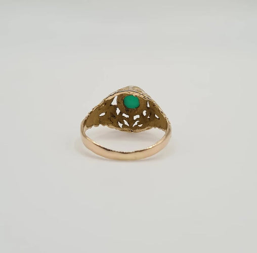 Bague 49 Bague or jaune sertie d'une pierre verte 58 Facettes