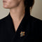 Broche Broche Mauboussin en or jaune, turquoises et saphirs 58 Facettes MAN2079