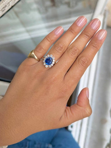 Bague 52 Bague marguerite en or jaune 18 carats, saphir et diamants 58 Facettes 111