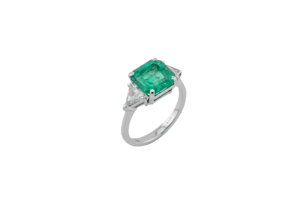 Bague Bague en or blanc 18 ct avec diamants triangulaires et émeraude 58 Facettes anl747