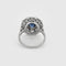 Bague 56 Bague Marguerite en platine et saphir ovale, entourage de diamants 58 Facettes LJ 24- 178