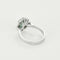 Bague 54 Bague marguerite en or gris 18k et diamants, émeraude ovale 58 Facettes BA519