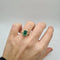 Bague 50 Bague solitaire or jaune 18 carats sertie d’une émeraude synthétique et halo de diamants laboratoires 58 Facettes