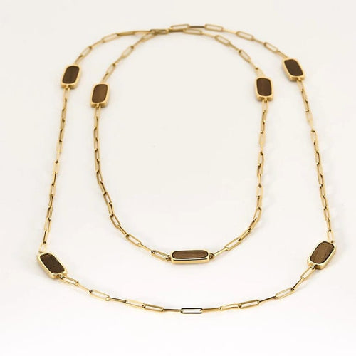 Collier DINH VAN - Rare sautoir de la collection Impression en or jaune et bois d'Amourette 58 Facettes LOR3480