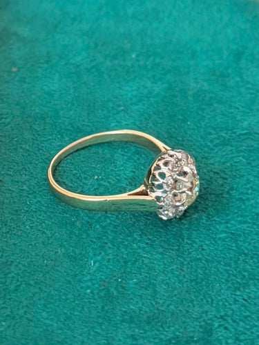 Bague 59 Bague marguerite en or jaune 18 carats et diamants 58 Facettes 112