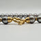Collier Collier or jaune serti de perles Tahiti 58 Facettes