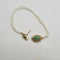 Bracelet Bracelet or jaune 14 carats serti de perles et pierre verte 58 Facettes