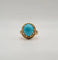 Bague 60 Bague or jaune sertie d’une turquoise 58 Facettes
